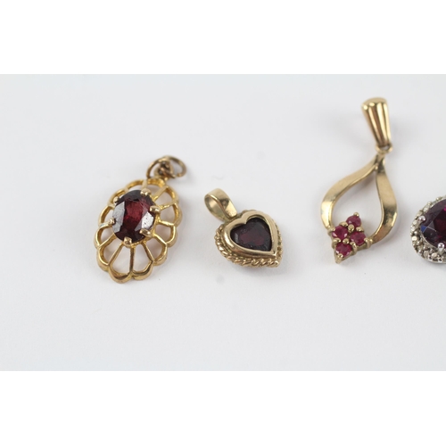 160 - 4 x 9ct gold gemstone pendants inc. diamond, garnet & ruby (3.6g)