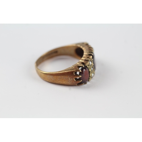 163 - 9ct gold garnet & seed pearl vintage ring (5.4g). Ring has been cut off Size  P