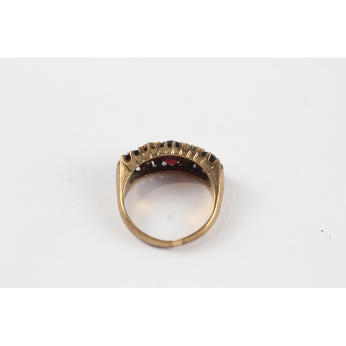 163 - 9ct gold garnet & seed pearl vintage ring (5.4g). Ring has been cut off Size  P