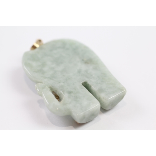 177 - 9ct gold jade elephant pendant with red paste eyes (20.2g)