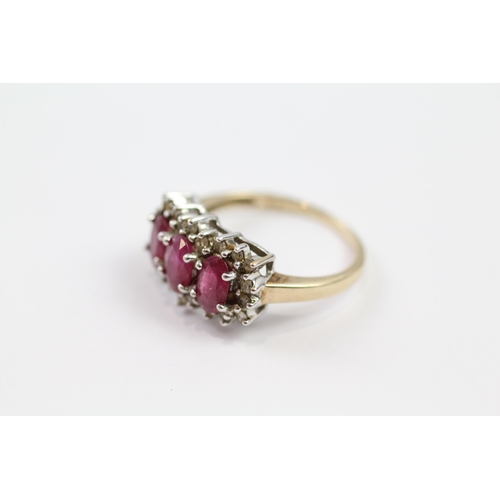 178 - 9ct gold synthetic ruby three stone ring with diamond frame (3.2g) Size  M