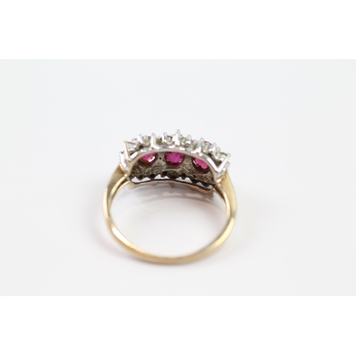 178 - 9ct gold synthetic ruby three stone ring with diamond frame (3.2g) Size  M