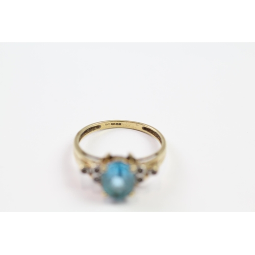 198 - 9ct gold diamond & blue topaz trefoil ring (2.7g) Size  Q 1/2