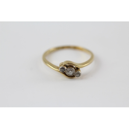 21 - 18ct gold antique diamond trilogy bypass ring (3.1g)