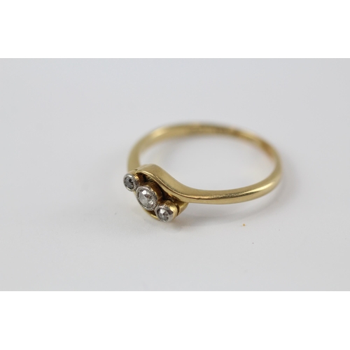 21 - 18ct gold antique diamond trilogy bypass ring (3.1g)