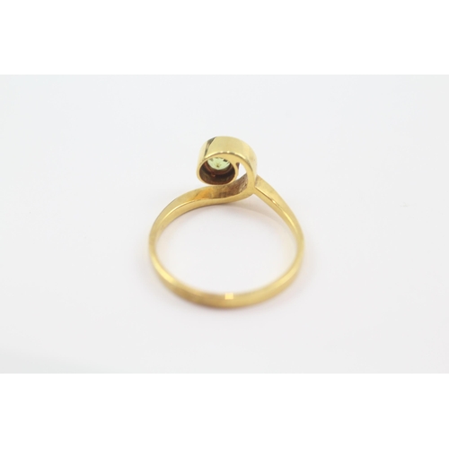 46 - 14ct gold peridot bypass dress ring (2.7g) Size  O