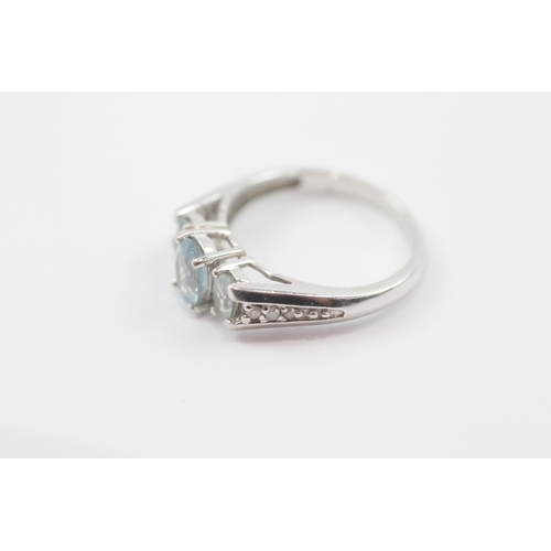 57 - 10ct white gold aquamarine & diamond trilogy ring (2.9g) Size  N 1/2