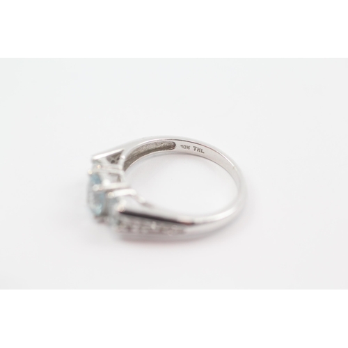 57 - 10ct white gold aquamarine & diamond trilogy ring (2.9g) Size  N 1/2