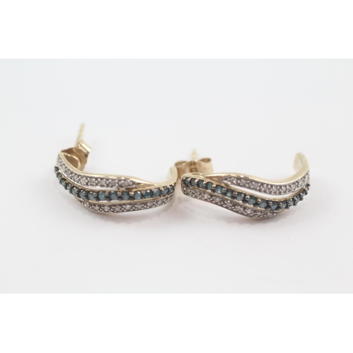 61 - 9ct gold diamond half hoop paired earrings (3.1g)