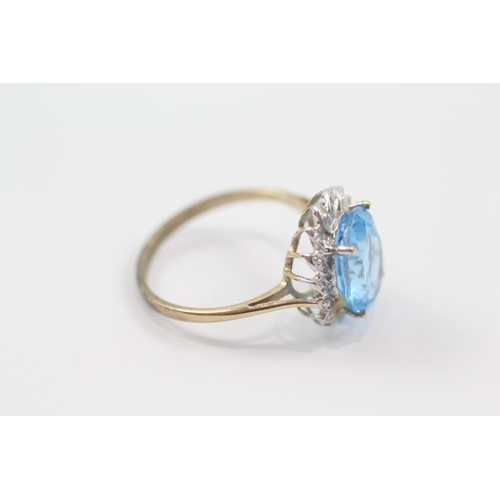 72 - 9ct gold blue topaz single stone ring with diamond frame (3.2g) Size  Q