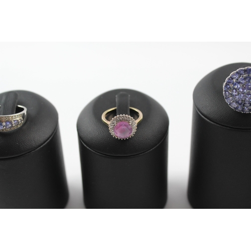 205 - A collection of silver gemstone rings including Amethyst (23g)