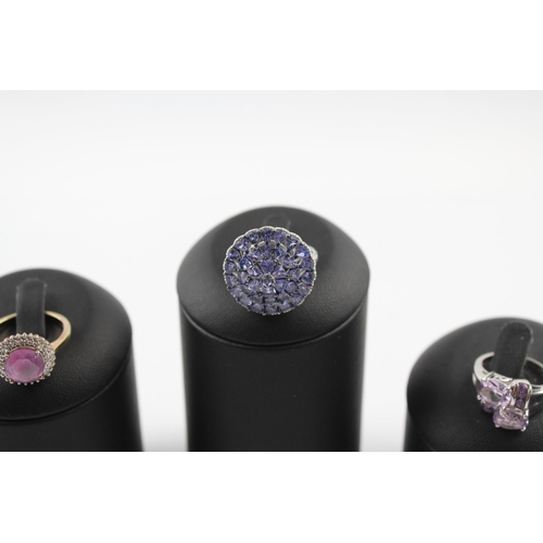 205 - A collection of silver gemstone rings including Amethyst (23g)