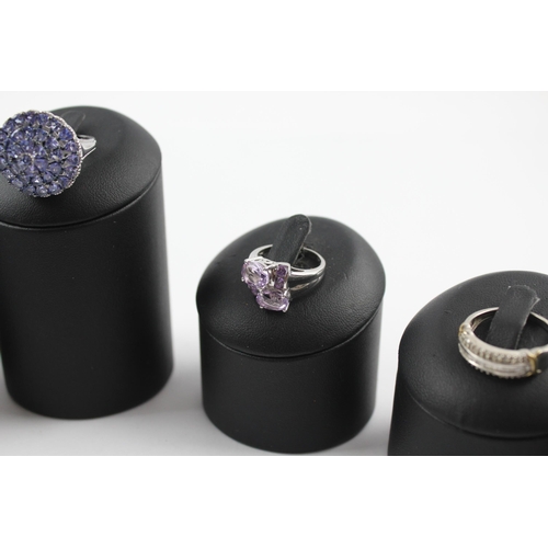 205 - A collection of silver gemstone rings including Amethyst (23g)