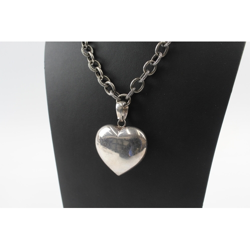 214 - Silver belcher link necklace with heart pendant signed by designer (79g)