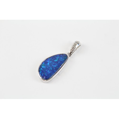 76 - 14ct white gold opal pendant with diamond set bail (2.4g)