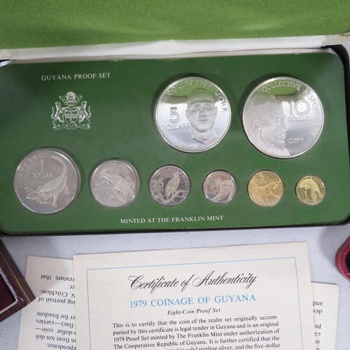 409 - 3x coin packs 1x containing Pobjoy Mint silver coin along with a Royal Marines silver coin weighing ... 