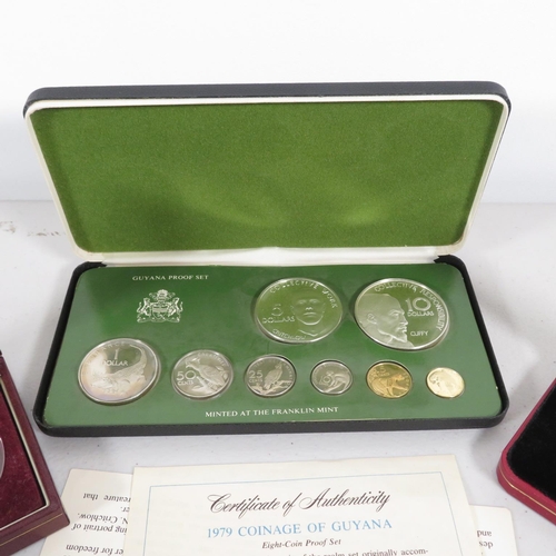 409 - 3x coin packs 1x containing Pobjoy Mint silver coin along with a Royal Marines silver coin weighing ... 