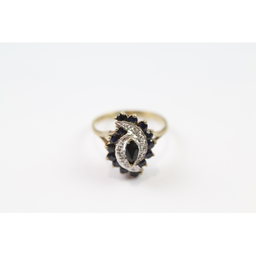 102 - 9ct gold diamond & sapphire cluster ring (3.1g) Size  L