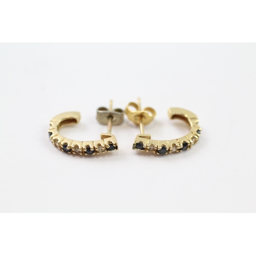 107 - 14ct gold diamond & sapphire half hoop earrings (1.8g)