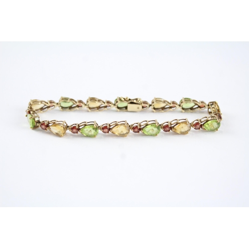 120 - 9ct gold garnet, citrine & peridot bracelet (6.8g)