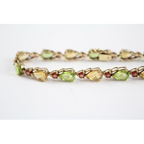 120 - 9ct gold garnet, citrine & peridot bracelet (6.8g)