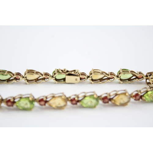 120 - 9ct gold garnet, citrine & peridot bracelet (6.8g)