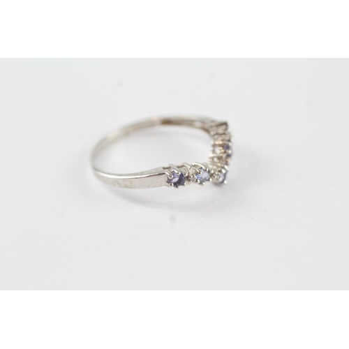 127 - 9ct gold tanzanite & diamond wishbone half eternity ring (1.7g) Size  R