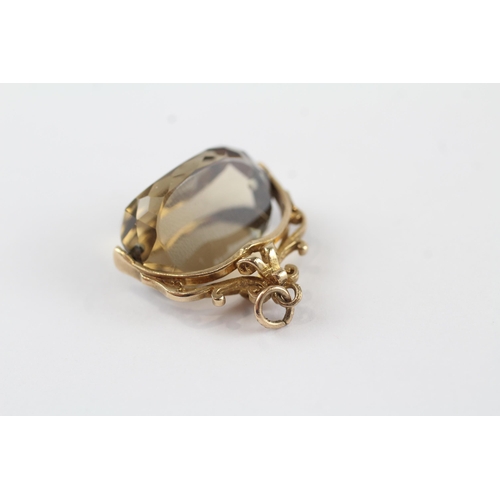 128 - 9ct gold citrine vintage fob (5.8g)