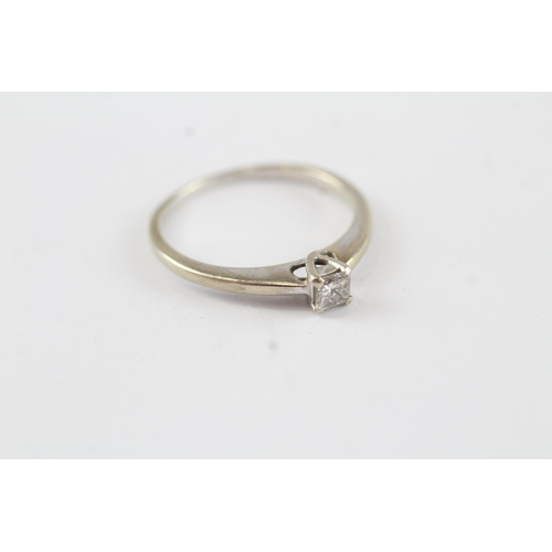 130 - 9ct gold diamond solitaire ring (1.6g) Size  M