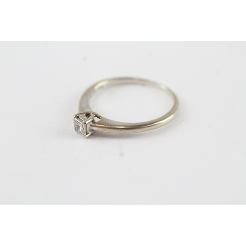 130 - 9ct gold diamond solitaire ring (1.6g) Size  M