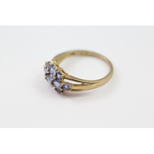 139 - 9ct gold tanzanite & diamond cluster ring (2.5g) Size  P