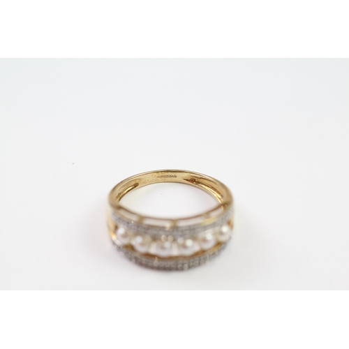 141 - 9ct gold diamond & cultured pearl eternity ring (3.1g) Size  P