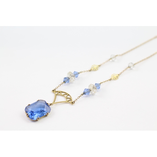 148 - 9ct gold blue & white paste necklace (5.7g)