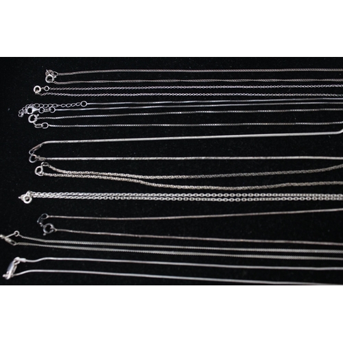 163 - A collection of silver chain necklaces including snake