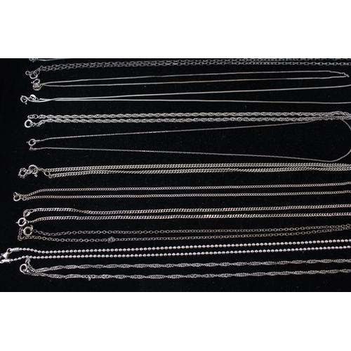 166 - A collection of silver chain necklaces including ball