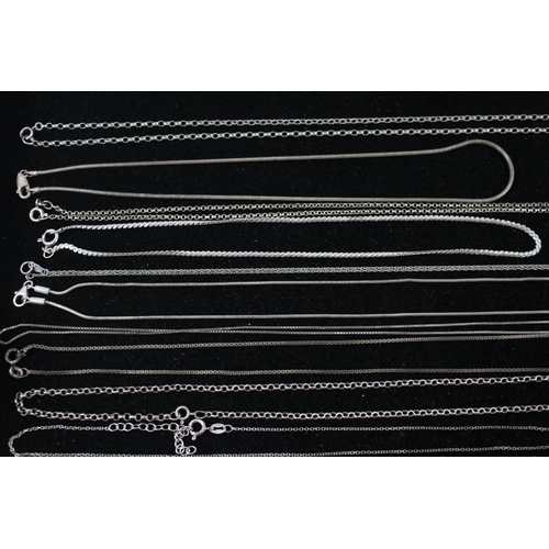 172 - A collection of silver chain necklace including serpentine