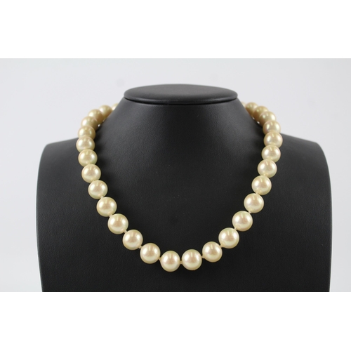 175 - Faux pearl necklace by designer Christian Dior