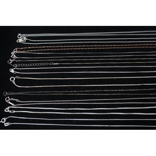 176 - A collection of silver chain necklaces including curb