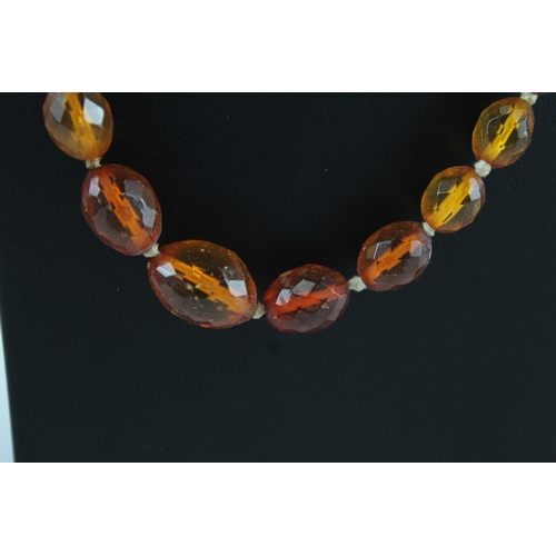 181 - Amber graduated necklace individually knotted