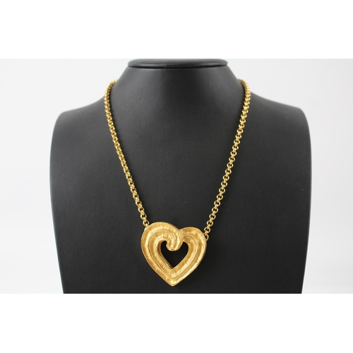 183 - Gold tone heart necklace by designer YSL with pouch