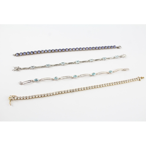 189 - Four silver gemstone tennis bracelets including CZ