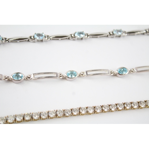 189 - Four silver gemstone tennis bracelets including CZ