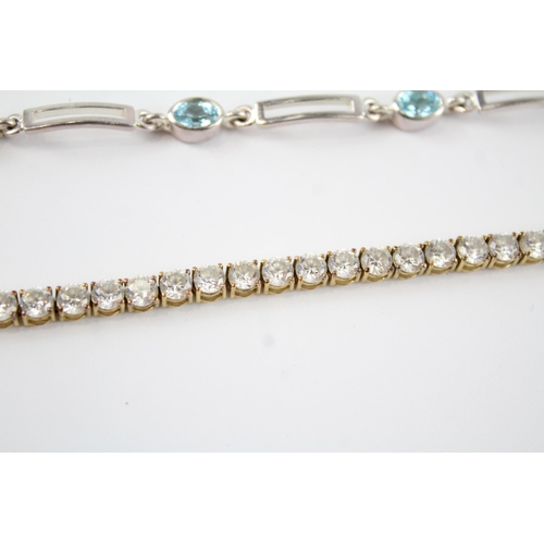 189 - Four silver gemstone tennis bracelets including CZ