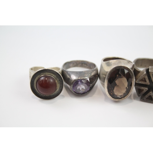 190 - Five silver modernist statement rings including gemstone