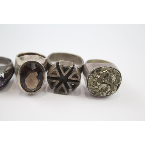 190 - Five silver modernist statement rings including gemstone