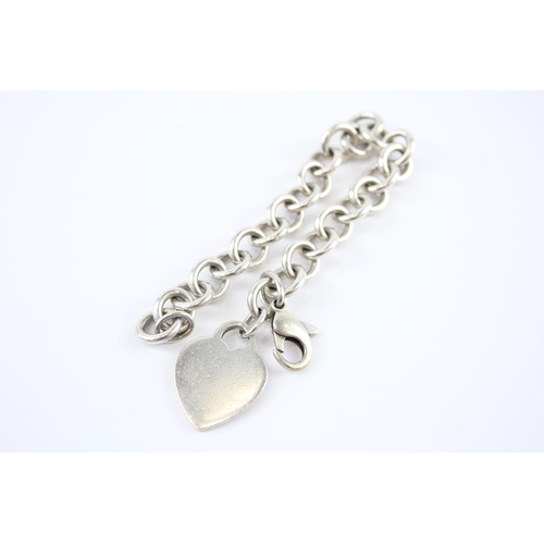 206 - Silver bracelet with heart tag by designer Tiffany & Co