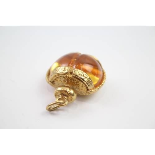 215 - Gold tone perfume bottle design pendant by designer YSL