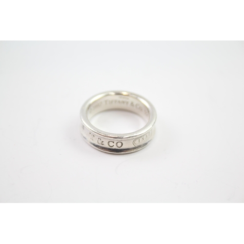 217 - Silver band ring by designer Tiffany & Co.  Size R 1/2