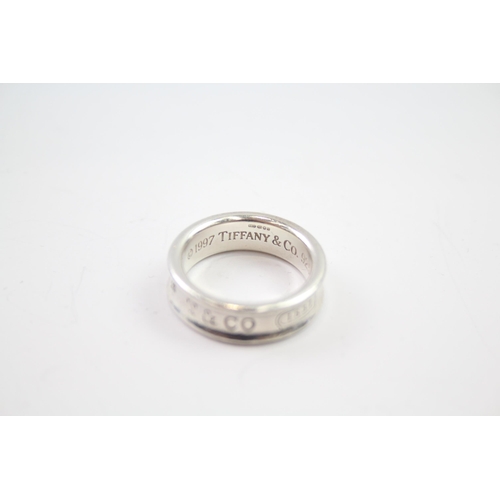 217 - Silver band ring by designer Tiffany & Co.  Size R 1/2