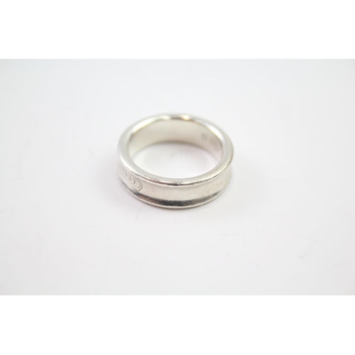 217 - Silver band ring by designer Tiffany & Co.  Size R 1/2